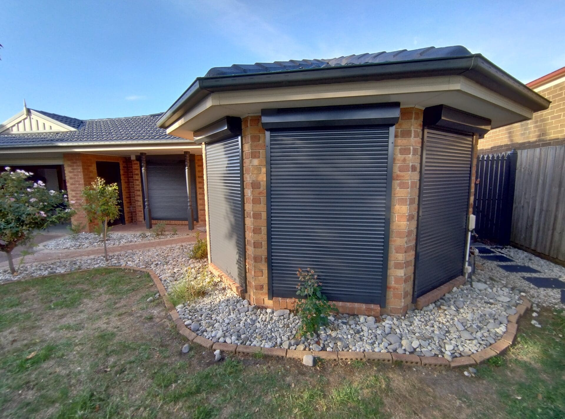 IMG_20230325_174901647_HDR a roller shutter with a roof