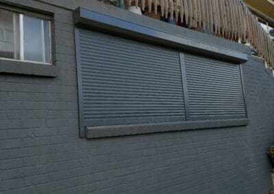 a building with a window and a balcony